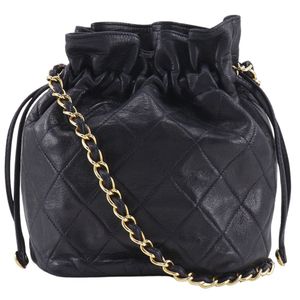 Pre-owned CHANEL Matelasse vintage lambskin drawstring purse, made in Italy, black, crossbody, women's.