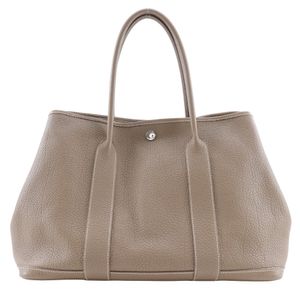 Pre-owned Hermès Garden Party 36 PM Tote Bag in Negonda Etoupe, Made in France, 2011. Suitable for shoulder or handbag use. A4 size. Snap closure. Women's.