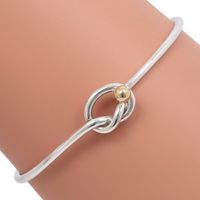 Tiffany & Co. Love Knot Ring, Size 10, 925 Silver and 18K Yellow Gold, approximately 3 grams, Women's, Pre-owned