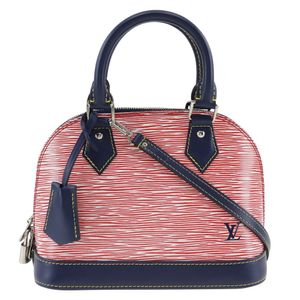 Pre-owned LOUIS VUITTON Alma BB handbag in Epi denim and 2-way shoulder bag, model M54548, made in France with Epi leather, red/navy, FL0137. Can be worn as a crossbody or handbag, and features a zipper. This 2-way zippered Alma BB bag is perfect for wome