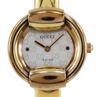 二手 Gucci 1400L 鍍金不鏽鋼手錶，配備石英機芯、模擬顯示和白色貝殼錶盤。
