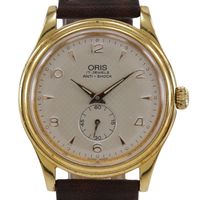 二手 Oris 7427-26 男士手錶，不銹鋼和皮革，金色飾面，手動上鍊（帶塞子），模擬顯示，銀色錶盤。