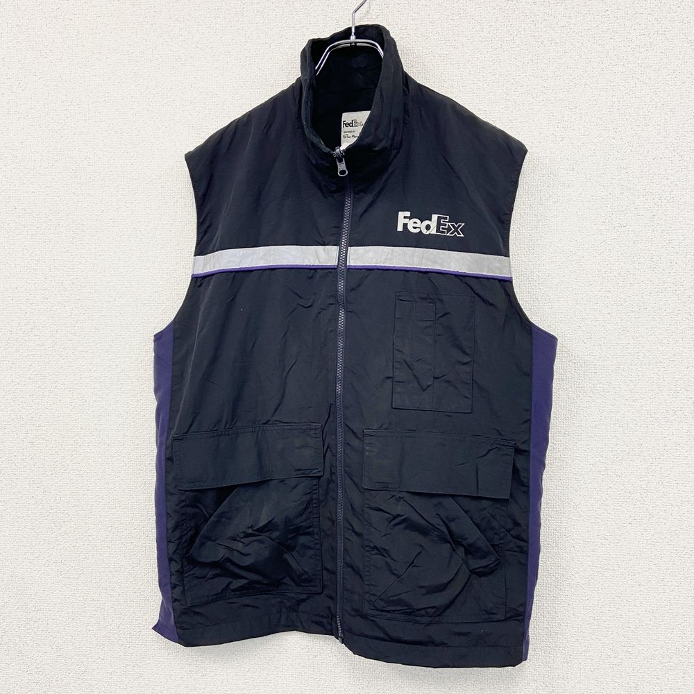 Used FedEx vest with fleece liner, corporate advertising, navy