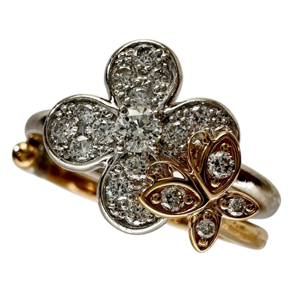 Pre-owned women's size 11 double ring with adjustable diamonds and 0.30ct karat gold in 18K white gold or 18K pink gold, weighing 5.1g.