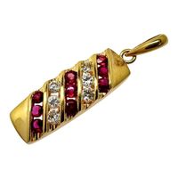 二手 18K 金吊墜，TOP鑲嵌 0.24 克拉紅寶石和 0.14 克拉鑽石，重 2.1 克。