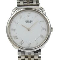Pre-owned Hermès Arceau men's watch in stainless steel with a white dial and quartz movement.