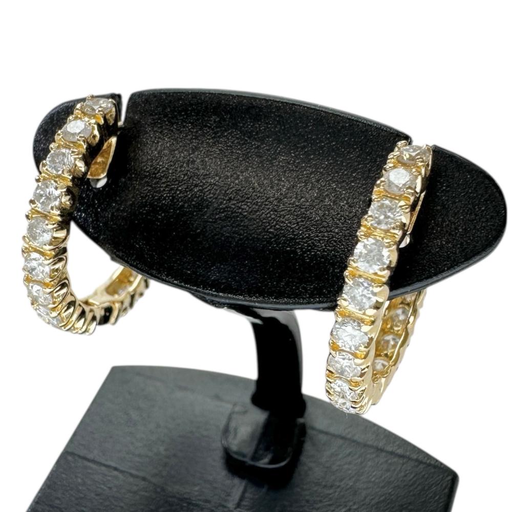 二手 18K 金耳环，镶嵌 0.50/0.50 克拉钻石，重 3.1 克，女士款。