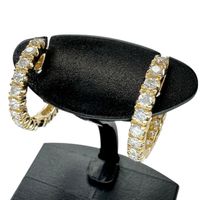 二手 18K 金耳環，鑲嵌 0.50/0.50 克拉鑽石，重 3.1 克，女士款。