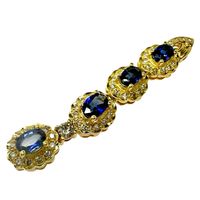 二手 18K 金TOP，鑲嵌 2.07 克拉藍寶石和 0.67 克拉鑽石，重 7.8 克。