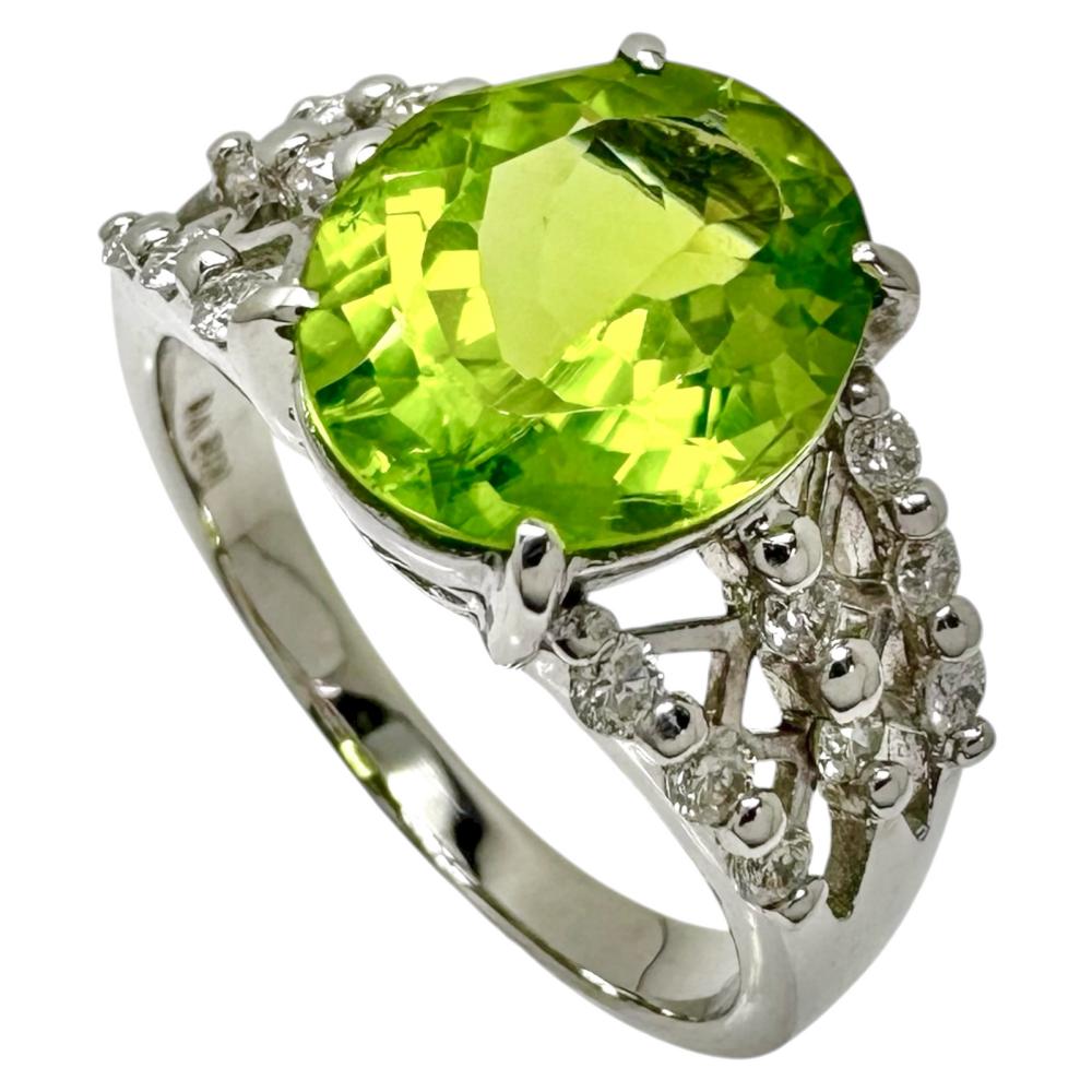 二手女戒指，19號，4.16克拉橄欖石和0.42克拉鑽石，7.3克，18K白金。