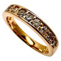 Pre-owned half eternity ring with 0.33ct diamonds in 18K pink gold, weighing 2.8g. Size 5.