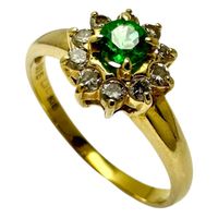 Pre-owned women's ring, size 12, featuring a 0.15ct emerald and 0.18ct diamonds, set in 18K gold, weighing 2.3g.
