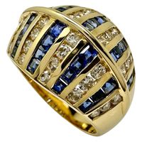 Pre-owned women's ring, size 12, featuring 2.50 carats of sapphire and 0.70 carats of diamonds, set in 18k gold, weighing 9.1g.