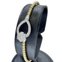 Pre-owned women's diamond bangle bracelet in 18K yellow gold/18K white gold, 0.43ct, 8.7g, 17cm.