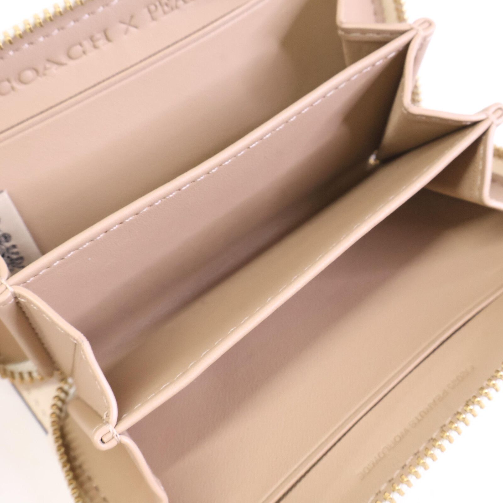 코치 【미품】CCB18 COACH X PEANUTS 스몰 Zip 어라운드 카드 케이스・뉴스페이퍼 프린트 | 日本二手精品 ｜ 도코데모