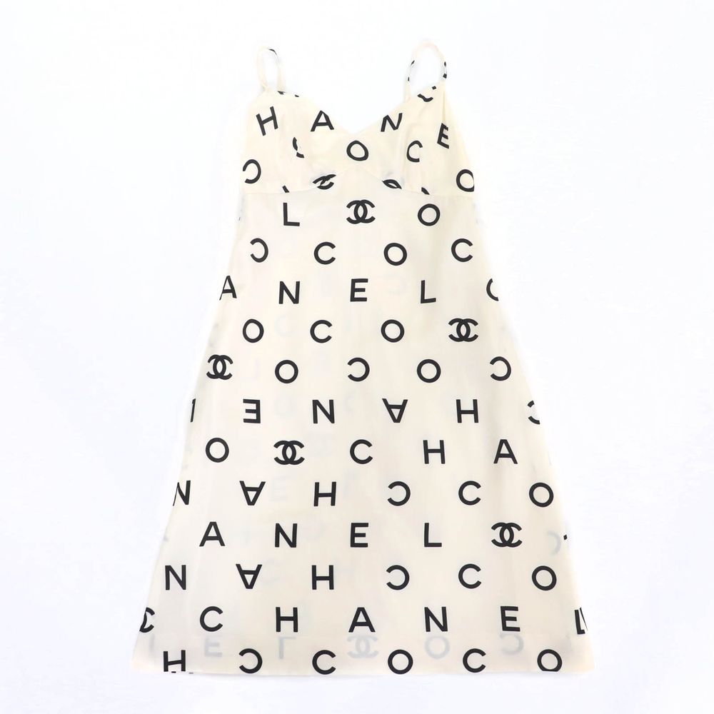 Excellent condition CHANEL BOUTIQUE Vintage 97P P07977 100% Silk Mini Dress  with Logo Print and Coco Mark Buttons, Ivory/Black, Size 36, Made in  France, Authentic, Women's |   DOKODEMO