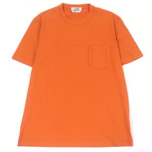 Authentic, unused Hermès 100% cotton crew neck short-sleeve pocket T-shirt with H logo embroidery. Orange, size M. Made in Italy.