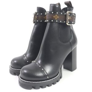 Excellent condition LOUIS VUITTON Star Trail Leather Monogram Studded Ankle Boots with Belt, Black, Size 36, Made in Italy, Women's
