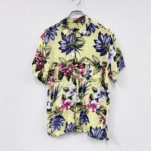 Used Styked by Originals short-sleeved aloha shirt with an all-over aloha pattern, featuring hibiscus and yellow, size LL.