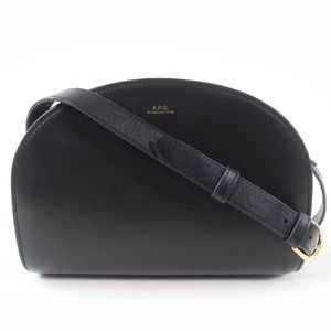 Excellent condition A.P.C. logo half-moon shaped leather shoulder bag in black with dust bag.