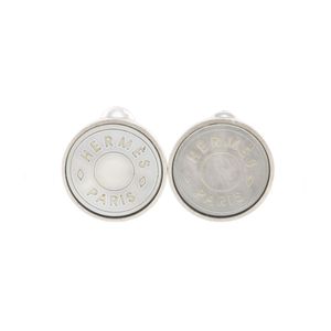 Pre-owned Hermès Serie earrings, Bijoutierie Fantaisie, vintage, metal and shell, silver, approximately 11.6g, for women.
