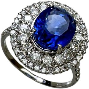 二手女式戒指，12号，镶嵌一颗3.98克拉斯里兰卡蓝宝石和一颗0.95克拉钻石，铂金（Pt950）戒托，重5.3克。