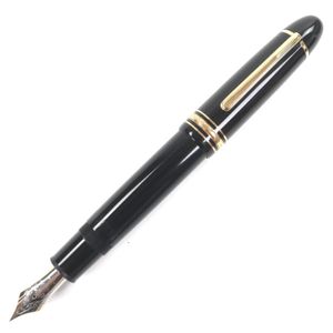狀態極佳的MONTBLANC Meisterstück 149 鋼筆，配有 14K 金筆尖和白色星形筆桿，黑色和金色，德國製造。