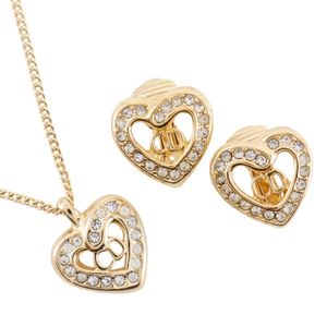 二手 Christian Dior CD 心形项链和耳环套装，镀金镶钻，约 5.3 克。女士 CD 心形。