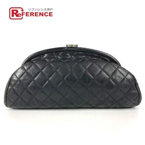 香奈兒 CC Coco 標誌搭扣菱格紋手拿包，有剝落痕跡