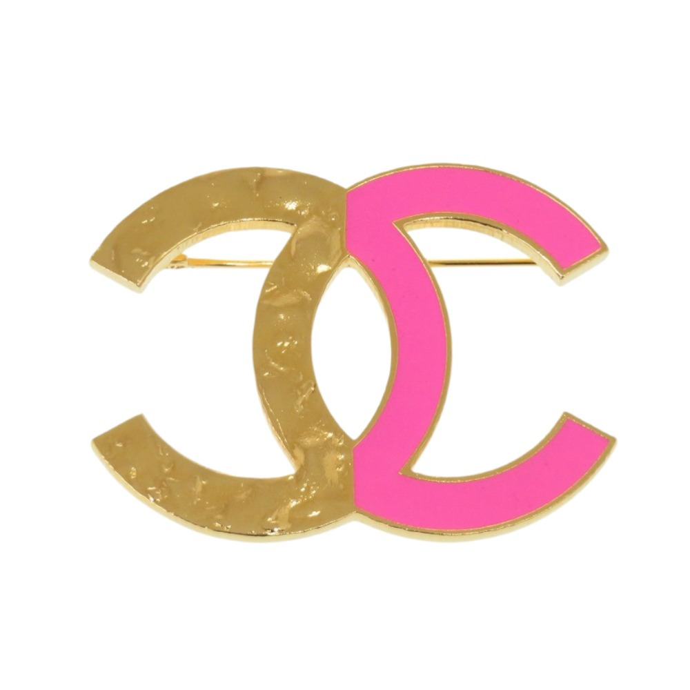Like new Chanel two Color Coco Mark metal gold and pink brooch