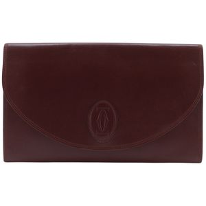 卡地亚 Must Line 系列手拿包，波尔多红小牛皮材质，磁扣开合。二手。女士款。