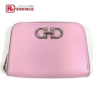 Salvatore Ferragamo coin purse with Gancini logo.