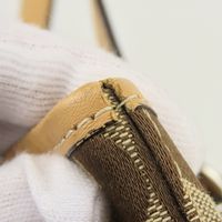 Coach 經典手提包，帆布和皮革材質 [二手]