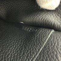 LOUIS VUITTON Portefeuille Lock Mini Tri-fold Wallet