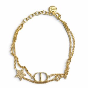 品相極佳 △DIOR B1133PMTCY Petit CD 雙手鐲，水晶星形設計，金色，女士配件，帶盒子和防塵袋。