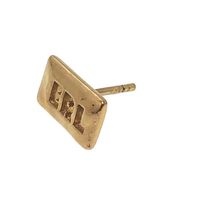 Dior logo accessory, single earring, fashion jewelry.