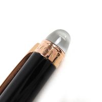 品相極佳 △MONTBLANC星際行者白色星形旋轉原子筆，黑色和金色，德國製造，男士，書寫測試。