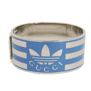 Used GUCCI enamel stripe cuff bracelet with interlocking G and Trefoil logo (GG S). Also includes an Adidas metal blue bangle (702882 J1631 8082).