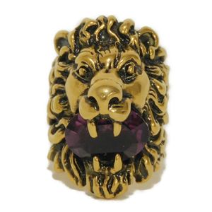 Pre-owned GUCCI crystal lion head ring, size 9.5, featuring Swarovski crystals, faceted plating, aged antique gold finish, and CLEAR purple rhinestones. (Item number: 402763 J1D50 8034)