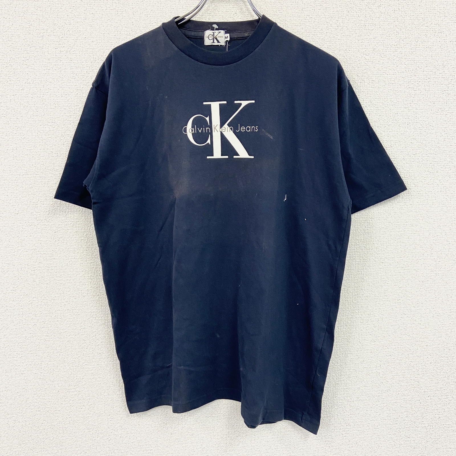 Calvin Klein Jeans短袖印花 T 卹，全新未使用，藏藍色，M 碼（古著）。