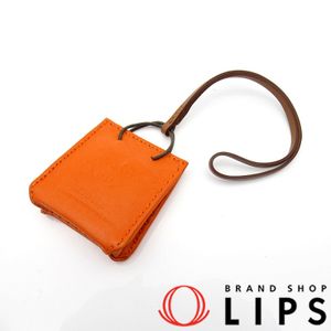 พวงกุญแจกระเป๋า Hermes Sac Orange หนัง Agneau Milo สำหรับสุภาพสตรี สี Feu/Gold [มือสอง]